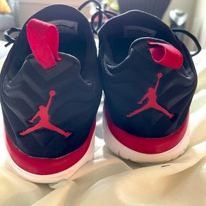 Michael Jordon Black and Red Sneakers. Good Condition. Mens 9.5